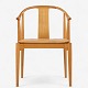 Hans J. Wegner / Fritz Hansen.
FH 4283 - Chinese chair in cherry with cushion in patinated natural leather. 
Manufacturer