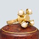 Jens Asby; Ring 
i 14 kt. guld 
med fire perler