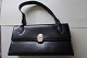 Taske sort med 
smart lukning
Inderlommer
L: 23cm
H: ...