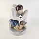Kinnerup Antik 
& Porcelæn 
præsenterer: 
B&G figur
2412
Grønlænder med 
barn