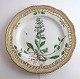 Lundin Antique 
præsenterer: 
Royal 
Copenhagen, 
Flora Danica. 
Frokost 
tallerken med 
gennemskåret 
bort. Design 
...