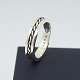 Antik Damgaard-Lauritsen præsenterer: Georg Jensen; Ring i sterlingsølv, nr. A106