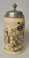Pegasus – Kunst - Antik - Design præsenterer: Tysk fajance krus med tinlåg 1909.