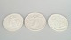 Royal Copenhagen, set of three biscuit wall plaques ...