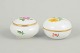 Meissen, set of two lidded jars with polychrome flower ...