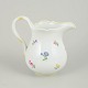 Meissen, large creamer with polychrome flower decoration.