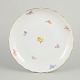 Meissen, large dish with polychrome flower decoration.