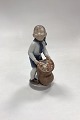 Danam Antik præsenterer: Royal Copenhagen Månedsfigur December - Dreng med Julesæk No. 4534