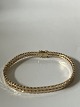 14K Guld Geneve Armbånd 1 Række Armbåndet er ...