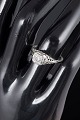 8 carat white gold ring.