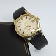 Antik Damgaard-Lauritsen præsenterer: Omega; Constellation armbåndsur i stål med guld, 1961