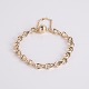 Osted Antik & Design præsenterer: Ole Lynggaard guldarmbånd i 14 karat med ikonisk ottetalslænke og original lås