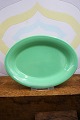 K&Co. presents: Ursula dish in faience from Royal Copenhagen designed by Ursula Munch-Petersen in light green ...