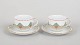L'Art præsenterer: Royal Copenhagen Christmas Joy, par kaffekopper med underkopper.