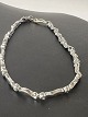 Antik Huset præsenterer: Armbånd i 14 karat hvidguld med indlagte diamanter.Længde 17,5 cm.