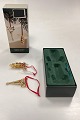 Georg Jensen Christmas Classics Fyrrekogle og Kræmmerhus ...