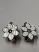 Antik Huset presents: Clip earrings with white enamel flowers in sterling silver.Measures 1.5x1.4 cm