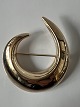 Antik Huset præsenterer: Hans Hansen; Broche af 14 kt. guld.Mål 4,8 cm x 4,1 cm.