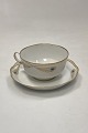 Danam Antik præsenterer: Royal Copenhagen Stel No. 118/2007 Tekop med Underkop Påfugl med Guldkant