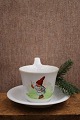 K&Co. præsenterer: Høj-hanks kop med julemotiv og guldkant fra Bing & Grøndahl...