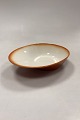 Danam Antik præsenterer: Royal Copenhagen Ursula Lille Serveringsskål i Okker No. 577