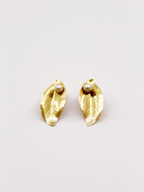 14 carat ear clips sold