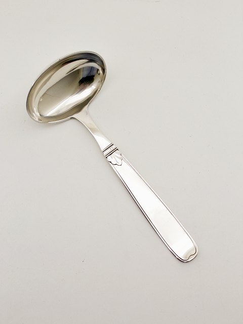 Silver sauce spoon