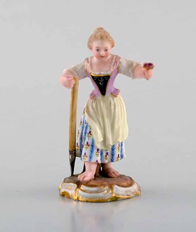 Rare antique Meissen miniature figure after Johann Joachim Kändler in 
hand-painted porcelain. Gardener. Dated 1850-80. Model Number 2869.
