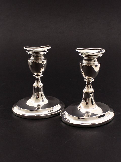 A pair of 830 silver candlesticks 12.5 cm. on oval foot