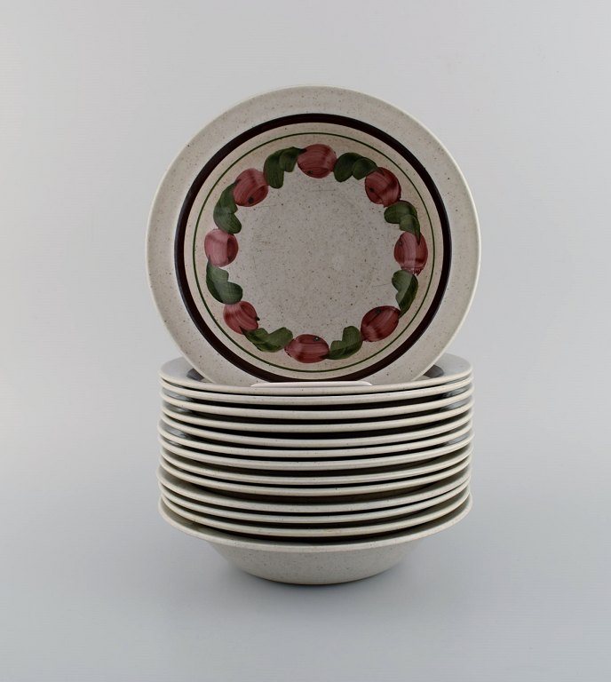 Jackie Lynd for Rörstrand. 14 Birgitta deep plates in hand-painted glazed 
stoneware. 1970s.
