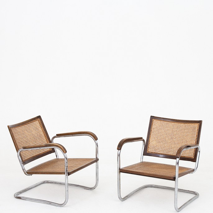 Frits Schlegel / Fritz Hansen
Sjældent par lænestole (model S102) af metal, originalt fransk flet og bejdset 
bøgetræ fra 1930erne.
Litteratur: 