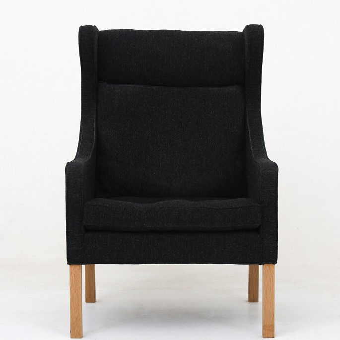 Børge Mogensen / Fredericia Furniture
BM 2204 - Wing-back chair, upholstered with Hallingdal 65-wool (colour 180) 
with legs in oak.
1 pc. in stock
Good, used condition
