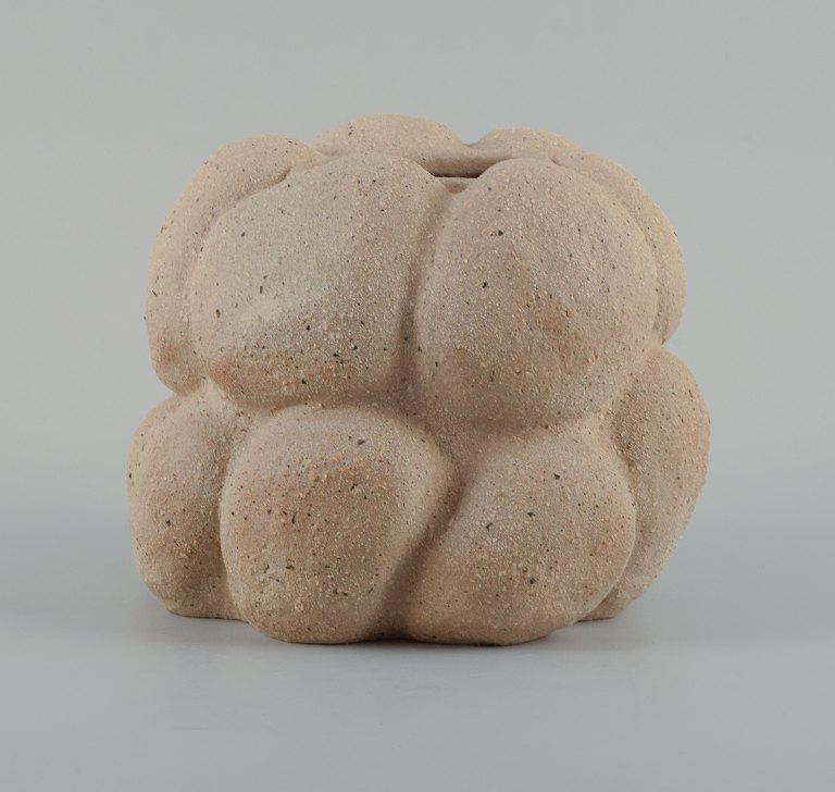 Christina Muff, Danish contemporary ceramicist (b. 1971). 
Unique stoneware vase. Unglazed, with specks the vessel is organically shaped.