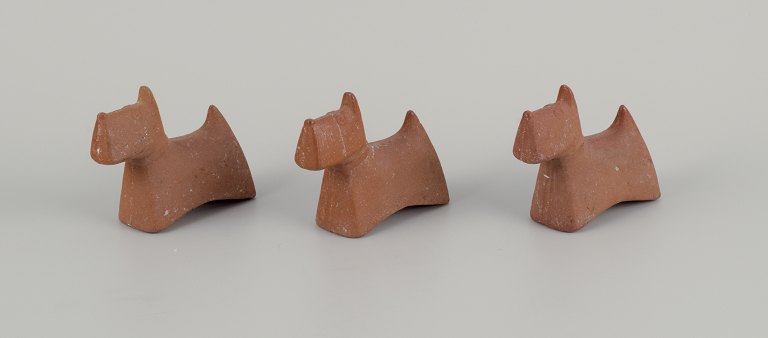 Stig Lindberg (1916-1982), three "Scotty" dogs in stoneware for Gustavsberg.