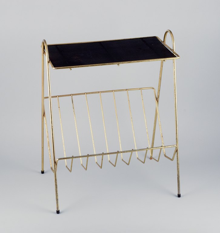 Mathieu Matégot, French industrial designer. Magazine holder in brass with black 
metal mesh.