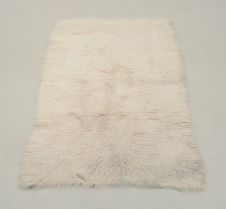 Scandinavian textile designer.
Rya carpet in pure wool.