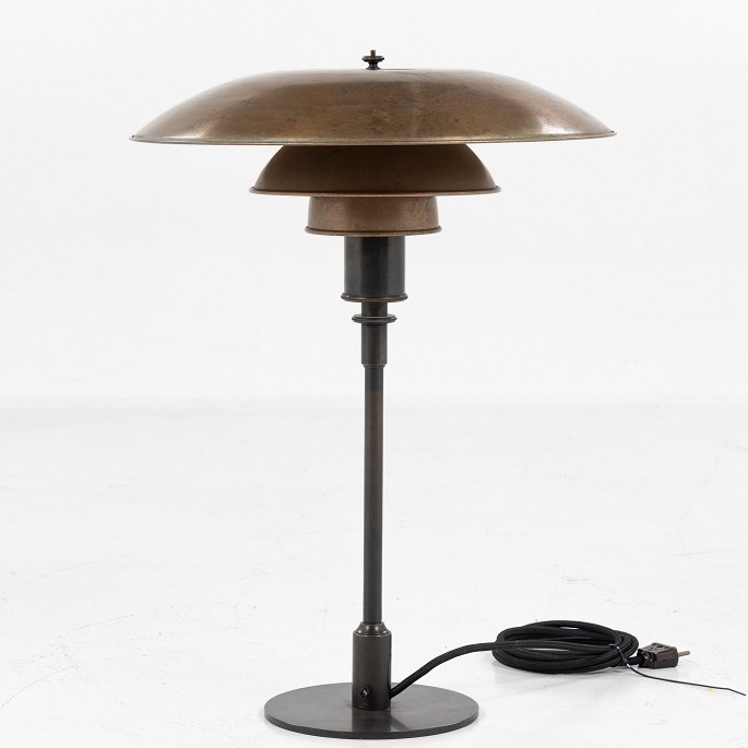 Poul Henningsen / Louis Poulsen
PH 4/3 - Rare table lamp in burnished brass and patinated copper shades. 
Labelled 