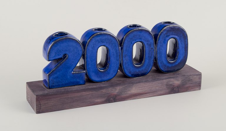 Lisa Larson for K-Studion, Gustavsberg, Sverige.
”Millenium 2000” lysestage af stentøj til fire lys.