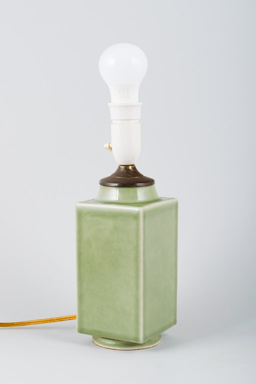 Chinese lamp in ceramic with brass fitting.
Celadon glaze.