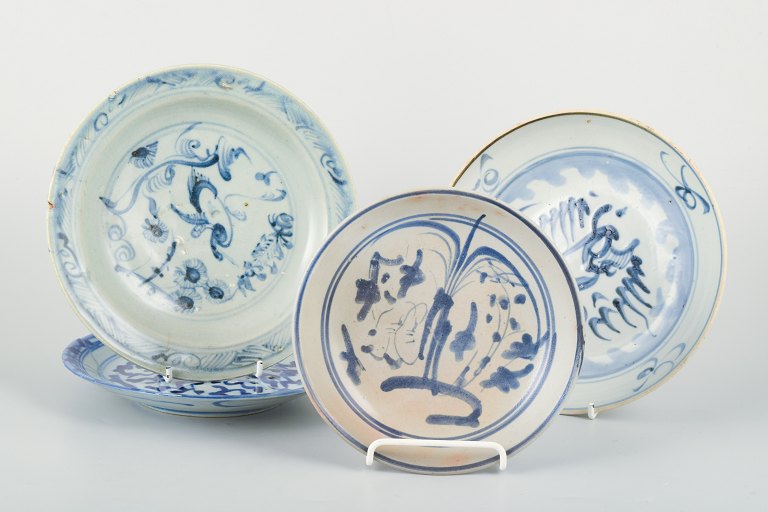 Four plates/dishes, probably Korea, decorated in blue underglaze.