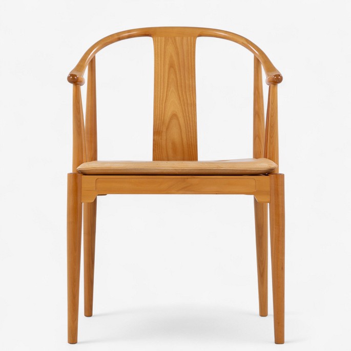 Hans J. Wegner / Fritz Hansen.
FH 4283 - Chinese chair in cherry with cushion in patinated natural leather. 
Manufacturer