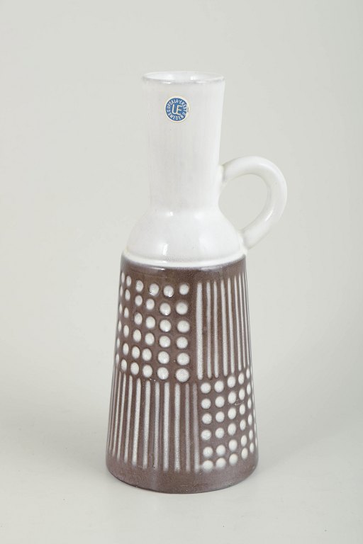 Mari Simmulson for Upsala Ekeby, pitcher.