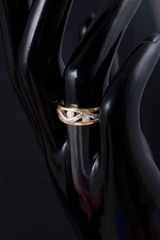 8 carat gold ring with three white stones.Danish goldsmith.