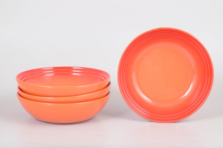 Le Creuset, set of four bowls.